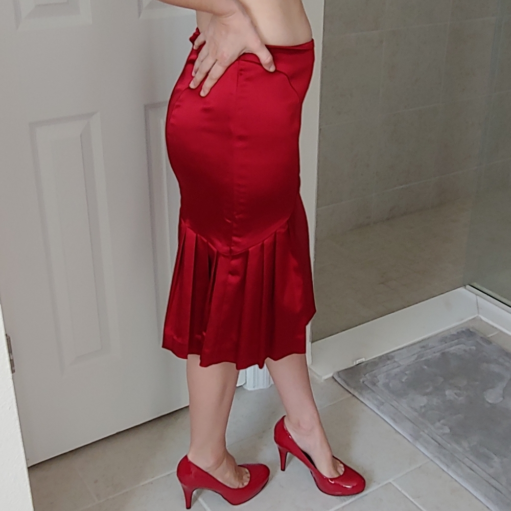 BEBE knee length skirt size 2